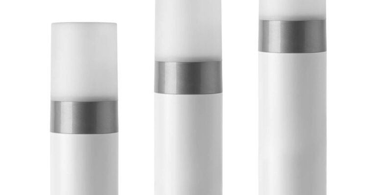 A lineup of white frosted fragrance bottles. Three bottles standing in line against a white background.