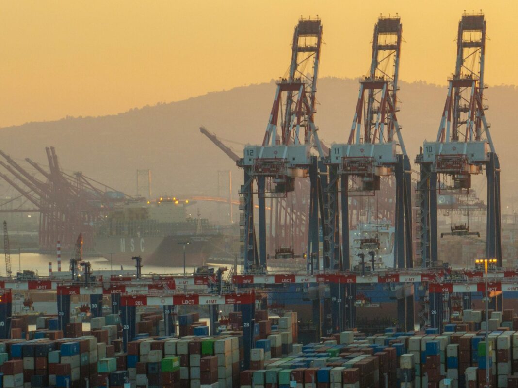 Photo by Stephen Leonardi: https://www.pexels.com/photo/a-large-container-ship-is-docked-at-a-port-28057311/